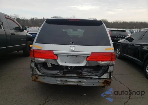 2010 Honda Odyssey Ex-L from USA, damaged, VIN 5FNRL3H74AB098938